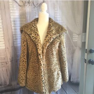 Animal print with loop buckled in front.